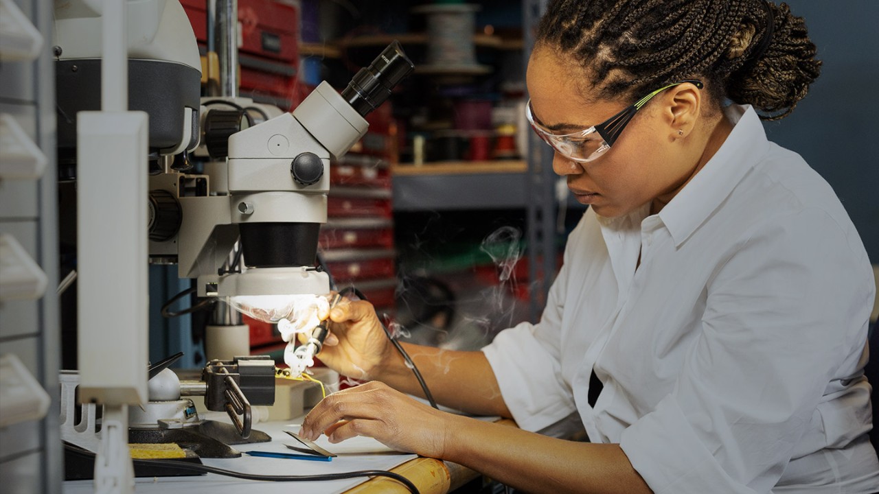 female engineer working hard