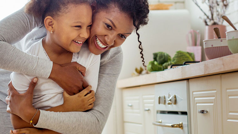 African American mother and child in house